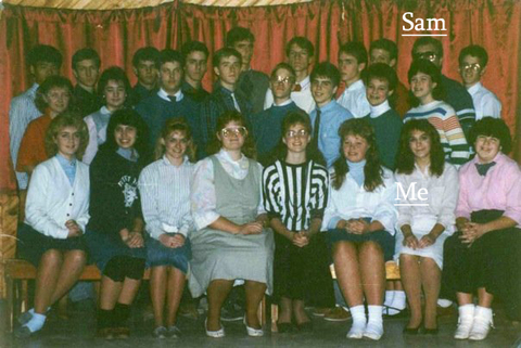 1980's high school photo of kids seated