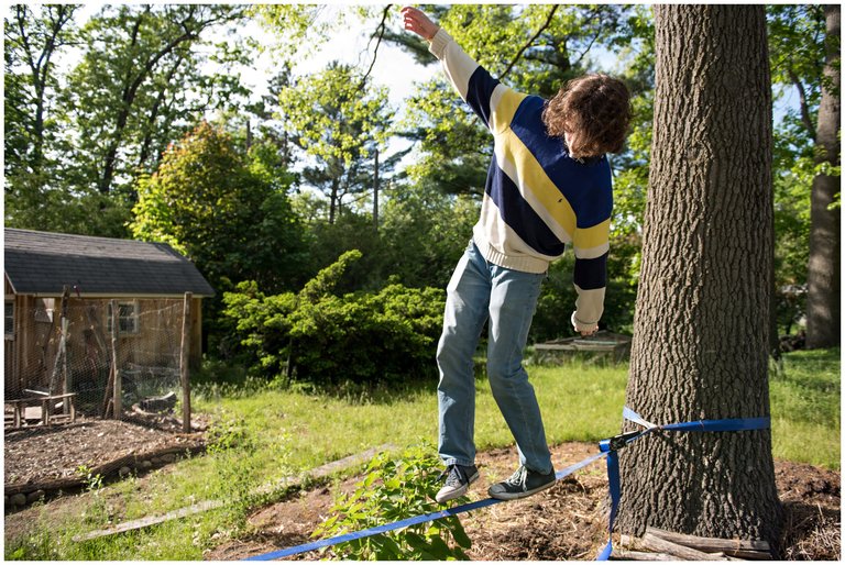 young man trying a slack line