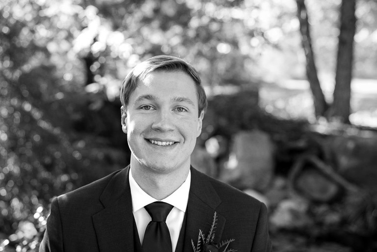 black and white portrait of the groom at Fox Hill Event Center