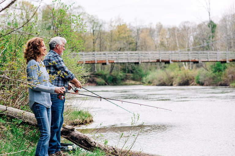 a couple fishing the Manistee River