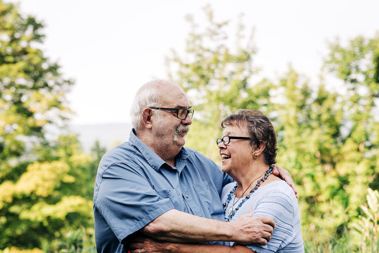 grandparents embrace at crsytal mountain