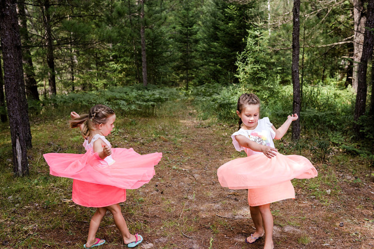little girls twirl at Ausable Riverview resort