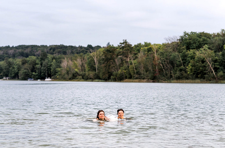two people swimming at labrys resort mi