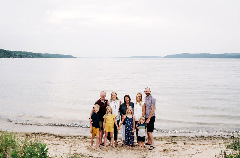 distant group photo of family at crystal lake mi