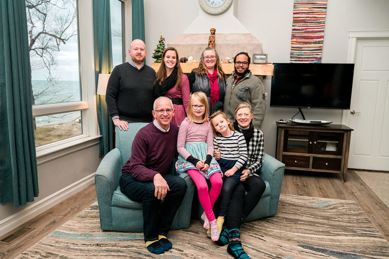 indoor family photo at a vacation rental in manistee mi