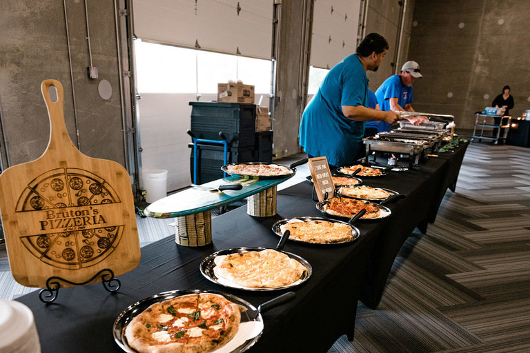 pizzas from tiki sams and Gravity BBQ in Holt catering by 