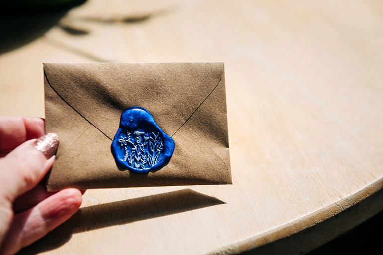 hand stamped envelopes with wildflower seeds