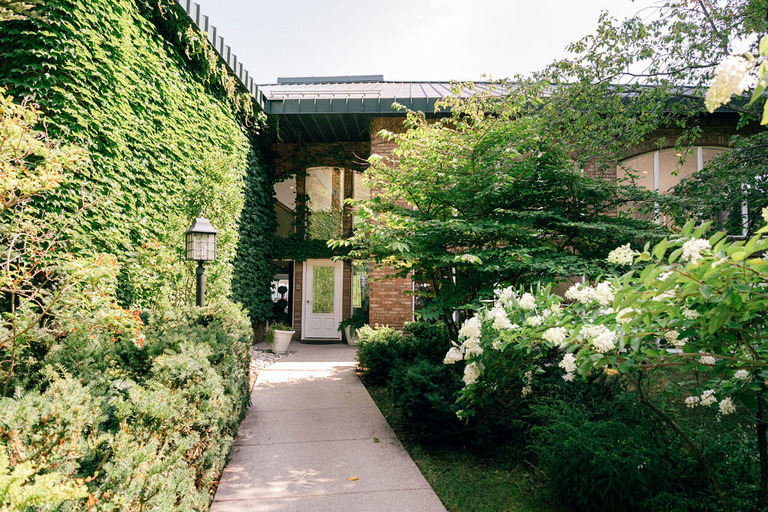 the greenery and entrance at the Northport Bay Retreat