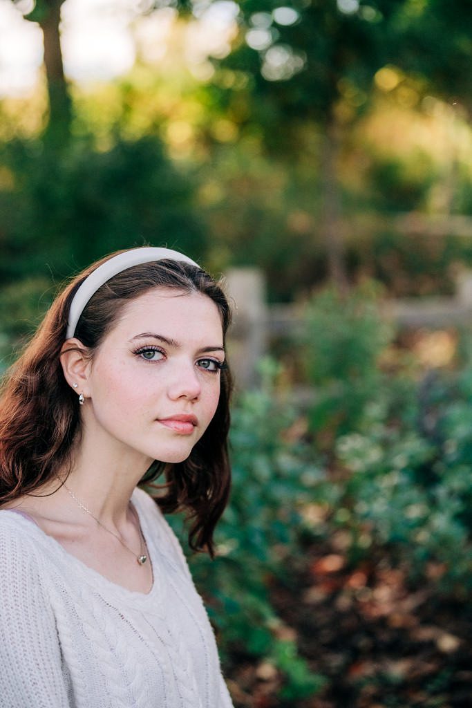 a senior photo taken at the gardens in traverse city